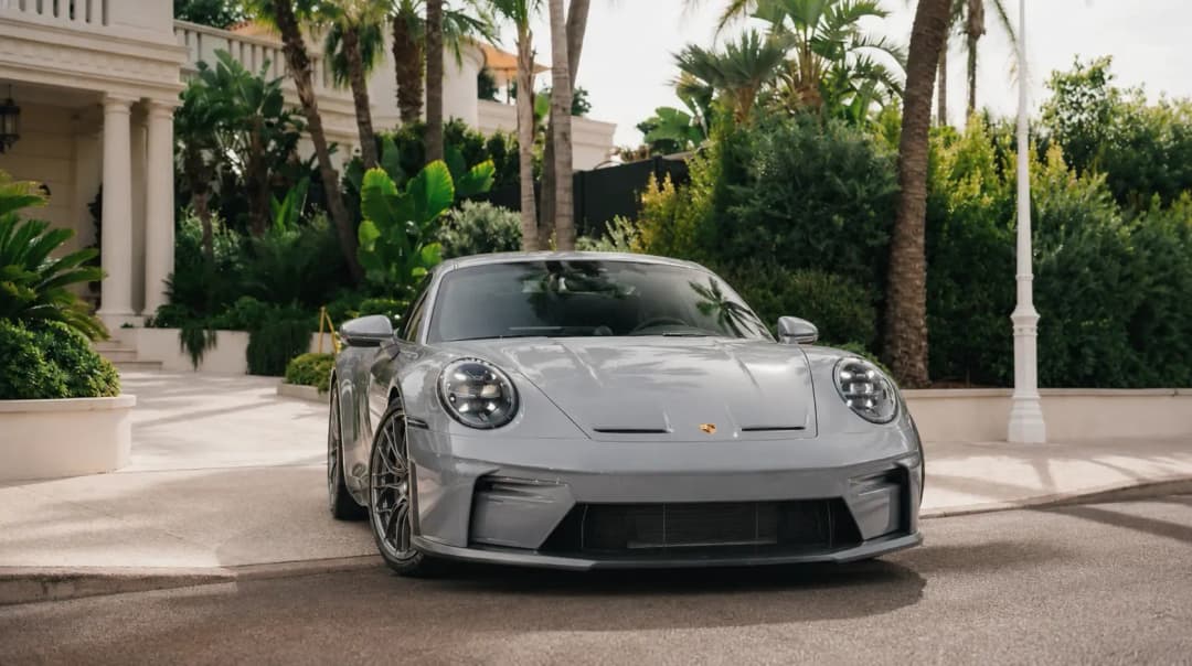 Porsche 911 GT3 Touring on Monaco plates delivered through the Rentolux structure